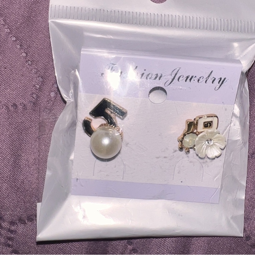 Earrings C C fashion studs. Super cute and brand new!